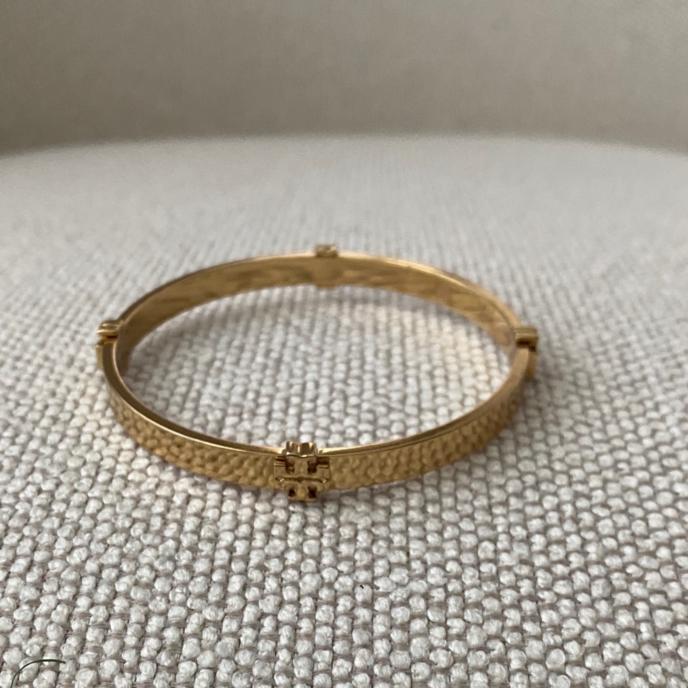 Tory Burch Gold Textured Bangle with Logo Cross Accent